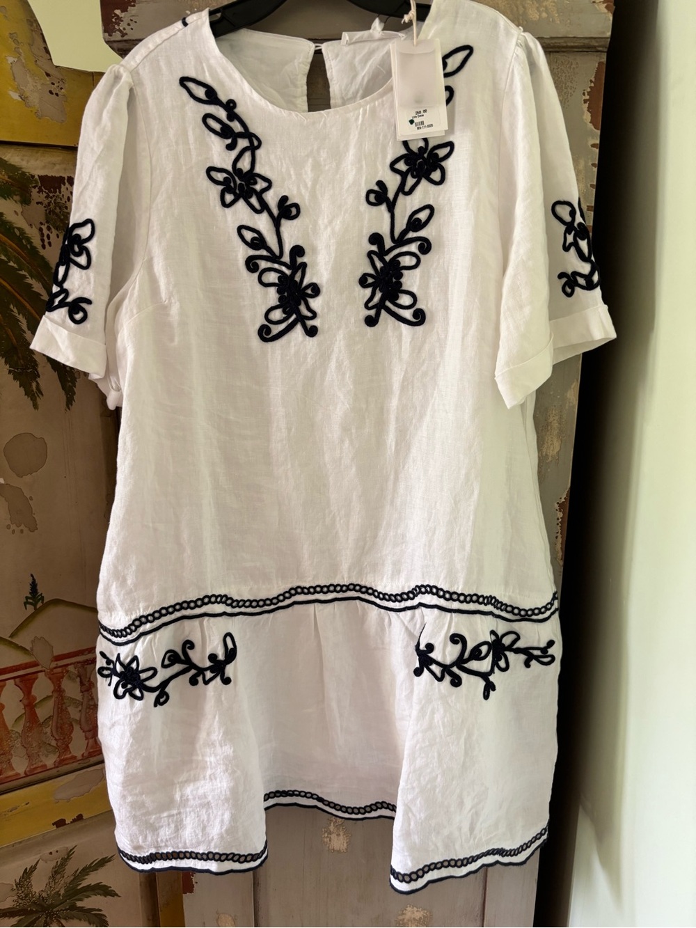 Melissa White Linen dress with blue Embroidered Accents
